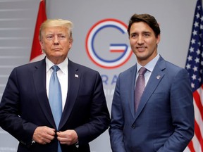 U.S. President Donald Trump, left, and Prime Minister Justin Trudeau hold a bilateral meeting during the G7 summit in Biarritz, France, August 25, 2019.