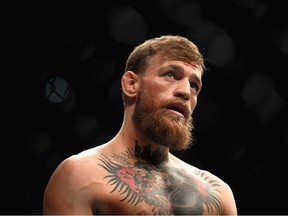 Conor McGregor of Ireland looks on in the octagon before competing against Khabib Nurmagomedov of Russia in their UFC lightweight championship bout during the UFC 229 event inside T-Mobile Arena on October 6, 2018 in Las Vegas, Nevada.