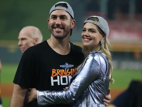 Justin Verlander of the Houston Astros and Kate Upton celebrate the 6-1 win over the Tampa Bay Rayst in Game 5 of the American League Division Series at Minute Maid Park on Oct. 10, 2019 in Houston, Texas.