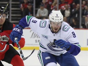 J.T. Miller of the Vancouver Canucks skates against the New Jersey Devils at the Prudential Center on October 19, 2019 in Newark, New Jersey.