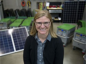 Zena Harris in front of solar panels and battery power stations at Portable Electric at 3095 Hebb Avenue in Vancouver on Wednesday, Oct. 16, 2019. Harris, Creative Director of the Sustainable Production Forum and President of Green Spark Group, is organizing a forum in November that will bring together film industry stakeholders to discuss how to make the industry more sustainable and environmentally friendly.