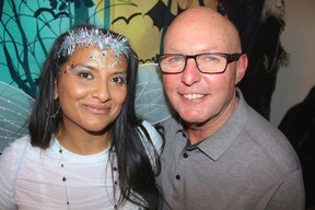 HALLOWEEN TREAT: West Side Family Place board member Mital Gorman thanked Westside realtor and West Side Family Place benefactor David Richardson for matching auction funds raised at their annual Ghostly Gala. Photo: Fred Lee.