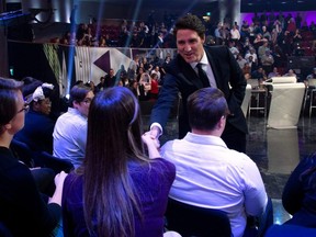Liberal Leader Justin Trudeau shakes hands with audience members following the Federal leaders debate in Gatineau, Quebec October 7, 2019. Sean Kilpatrick/Pool via REUTERS