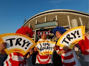 Japan supporters pose  outside the City of Toyota Stadium in Toyota City ahead of the  Japan 2019 Rugby World Cup Pool A match between Japan and Samoa on October 5, 2019. (Photo by Adrian DENNIS / AFP)