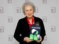 Canadian author Margaret Atwood poses with her book 'The Testaments' during the photo call for the authors shortlisted for the 2019 Booker Prize for Fiction at Southbank Centre in London on October 13, 2019.