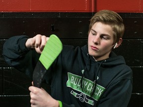 Zak Gershman uses green tape on his hockey stick in honour of his late older brother Jesse.