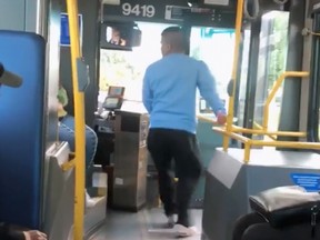 A passenger was filmed spitting on a TransLink bus driver Tuesday in New Westminster.