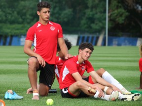 'Frankie' Facchineri and Nathan Demian take a break during the Canadian men's U17 national camp in Québec in August.  The two Vancouver Whitecaps academy centrebacks are part of a group of six Caps heading to Brazil for the U17 World Cup.