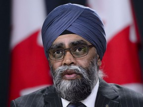 Defence Minister Harjit Sajjan was on course Monday to be re-elected for the Liberals in Vancouver Sotuh