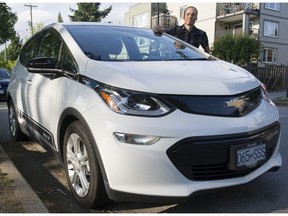 Neil MacEachern of Plug In BC with his personal electric vehicle, Vancouver July 03 2019.