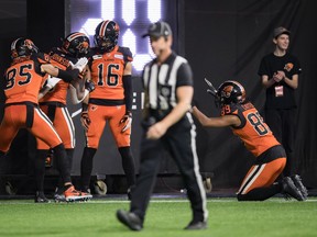 The B.C. Lions couldn't do much right for the first 10 games of this CFL season. Then, after Kelly Bates took over as offensive line coach the team has been on a tear. Lions' Rashaun Simonise, left to right, Shaq Johnson, Bryan Burnham and Duron Carter celebrate Burnham's touchdown against the Toronto Argonauts on Oct. 5.