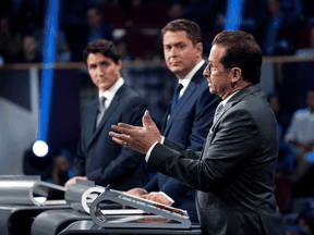 Liberal Leader Justin Trudeau, Conservative Leader Andrew Scheer and Bloc Quebecois Leader Yves-Francois Blanchet take part in a French-language leaders debate in Gatineau, Que. on Oct. 10, 2019.