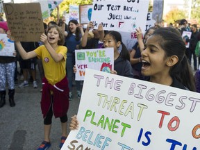 Tens of thousands of people concerned about the state of the earth's climate converged on Vancouver city hall Friday, September 27, 2019 as part of a global initiative to bring attention to the environment.