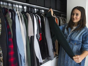 Fashion journalist Monika Markovinovic gave up buying new clothes for a year. She is pictured in her Port Moody apartment .