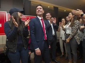 Patrick Weiler, second from left, was elected in West Vancouver-Sunshine Coast-Sea to Sky Country. He is age 33.