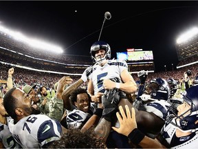 Kicker Jason Myers of the Seattle Seahawks is carried off the field after making the winning 42 yard field goal in overtime to win 27-24 over the San Francisco 49ers at Levi's Stadium on November 11, 2019 in Santa Clara, California.