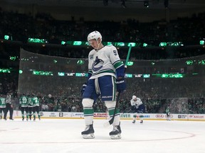 Troy Stecher of the Vancouver Canucks skates off after a goal by the Dallas Stars in the third period at American Airlines Center on November 19, 2019 in Dallas, Texas.