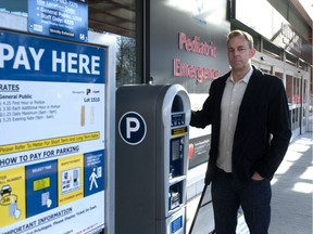 NDP members have backed a call for government to remove paid parking from hospitals for patients and families, similar to a plan by Jon Buss, pictured outside Surrey Memorial Hospital, and his HospitalPayParking.ca campaign.