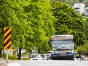 A bus on Production Way heads to SFU.