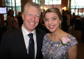 Walter Brennan, a father of two kids with cystic fibrosis and CF patient Kim Wood took in La Nuit en Rose fundraiser to make a difference in the lives of people who live with CF. Thanks to research, Canadians born with CF can expect to live well into their 50s. Photo: Fred Lee.