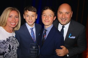 FAMILY AFFAIR: Charitable giving is a family decision for the Montalbano Family — Dana, Luke, Marco and John. They received the Outstanding Philanthropist Award. Photo: Fred Lee.