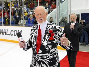 2010:  Don Cherry and Ron MacLean of Hockey Night in Canada walk to centre ice in Dundas, Ontario.