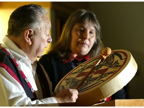 Clan Chief Adam Dick and Kim Recalma-Clutesi sing a traditional song.