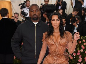 In this file photo taken on May 06, 2019, Kim Kardashian and Kanye West arrive for the 2019 Met Gala at the Metropolitan Museum of Art on May 6, 2019 in New York.