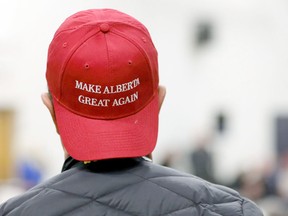 A supporter attends a rally on November 16, 2019, in Calgary for Wexit Alberta, a separatist group seeking federal political party status.