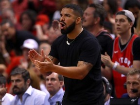 Drake reacts during Game 5 of the 2019 NBA Finals between the Golden State Warriors and the Toronto Raptors at Scotiabank Arena in Toronto, on June 10, 2019.
