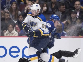 Even referee Ian Walsh got caught up in the heavy hitting Tuesday at Rogers Arena.