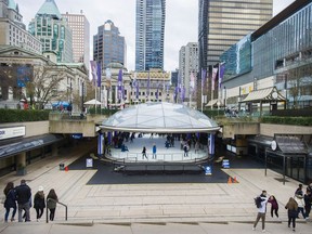 Skaters at the Robson Square Ice Rink in downtown Vancouver.