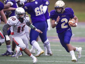 Alex Zychlinski of the Vancouver College Fighting Irish carries the ball against the New Westminster Hyacks in Vancouver on Oct. 1, 2019. The Fighting Irish are heavily favoured to knock off the Rutland Voodoos on Saturday.