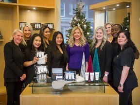Wendy Lisogar-Cocchia, centre, and staff of Absolute Spa at Century Plaza Hotel in Vancouver.