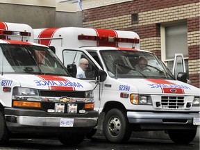 Paramedics and ambulances at St. Paul's Hospital.