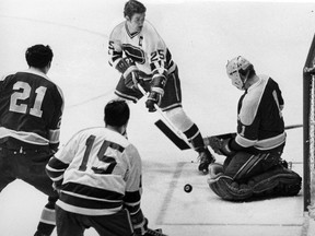 Vancouver Canucks captain Orland Kurtenbach sweeps the puck into the net for his 19th goal of the 1970-71 NHL season against the visiting California Golden Seals on March 28, 1971.