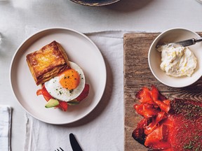 The irresistible Breakfast Biscuits fromGather: A Dirty Apron Cookbook by David Robertson ( Figure 1 Publishing) are topped with gravlax and fried egg.
