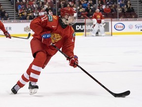 Vasili Podkolzin of Russia skates with the puck in the Bronze Medal game of the 2019 IIHF World Junior Championship against Switzerland on January, 5, 2019 at Rogers Arena in Vancouver, British Columbia, Canada.