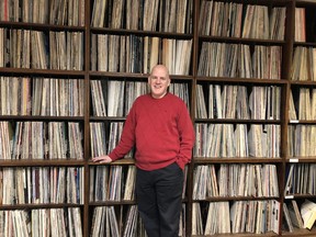 Bill Blair, music and media librarian at the University of Victoria, with some of what will remain of the UVic Libraries's vinyl collection after they auction of more than 5,900 records this week. [PNG Merlin Archive]