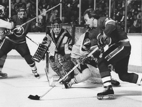 Vancouver Canucks netminder Richard Brodeur watches Bob Nystrom of the New York Islanders during the 1982 Stanley CupFinal. Photo: Wayne Leidenfrost/The Province.