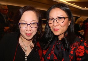 Perusing the pageant’s silent auction items were local Chinese leaders and philanthropists Stella Chan and Pao Yao Koo. Photo: Fred Lee.