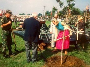 Janice Nikkel helps plant the memorial sugar maples at Fort Campbell, Kentucky, in 1986.