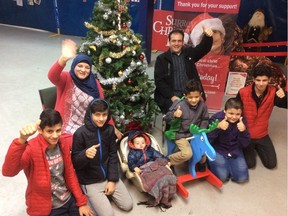 The Assaf family — mom Khawal and dad Mhd Khaldoun (back row) and sons (left to right, front row) Mammed, 15, Imatd, 14, Assa, 1, Fares, 7, Mause, 11, and Haidar, 16 — are grateful for being sponsored to live in Canada after leaving wartime Syria and spending seven years in a Lebanese refugee camp. They’re receiving help this year from the Surrey Christmas Bureau, which receives funding from The Province Empty Stocking Fund.