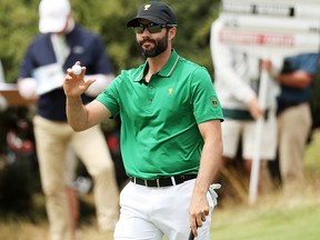 Adam Hadwin of Canada and the International team reacts to his birdie to go one up on the first green during Friday foursome matches on Day 2 of the 2019 Presidents Cup at Royal Melbourne Golf Course on Dec.13, 2019 in Melbourne, Australia.