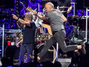Roger Daltrey (L) and Pete Townshend of British rock band The Who perform at the Toyota Center on the second leg of their Moving On! tour on September 25, 2019 in Houston, Texas.