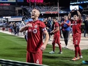 Michael Bradley and TFC celebrate after beating New York in the MLS playoffs. USA TODAY