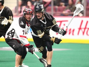Warriors forward Riley Loewen carries the ball against the the Calgary Roughnecks during the Warriors’ season opener on Nov. 29 at Rogers Arena, a 12-7 loss that looked better on the scoreboard than the game actually was for the hosts.