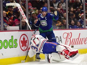 Montreal Canadiens goaltender Carey Price (31) collides with Vancouver Canucks forward Bo Horvat (53) behind the net during the first period.