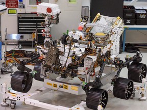 The Mars 2020 Rover is seen in the spacecraft assembly area clean room, Dec. 27, 2019 during a media tour at NASA's Jet Propulsion Laboratory in Pasadena, Calif.