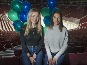 Holly Horvat, left, and Giselle Sutter at Rogers Arena on Dec. 4. They're gearing up for the annual Canucks balloon-sale and coin-collection fundraiser to raise money for families in need as part of The Province's Empty Stocking Fund campaign.
